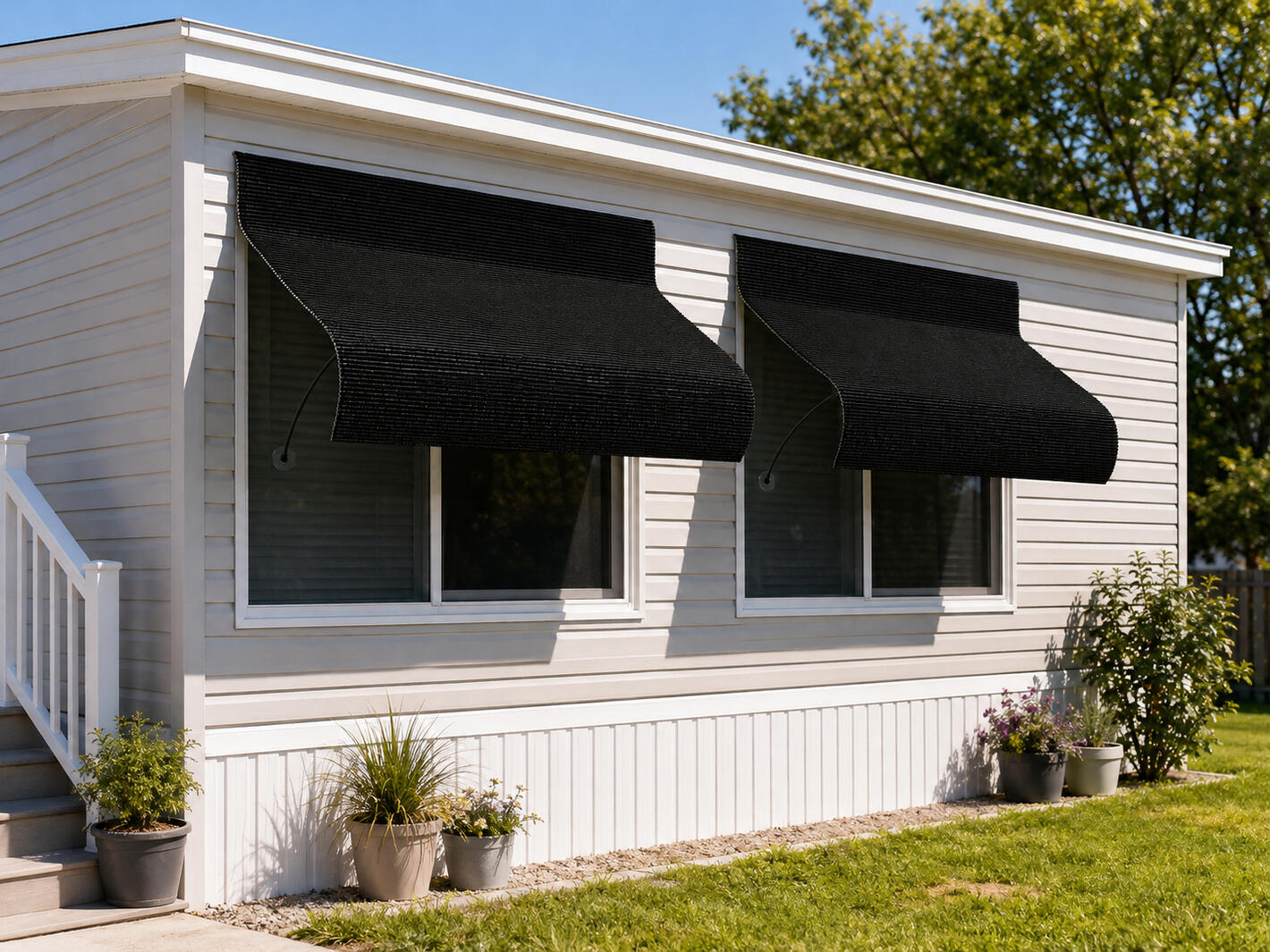 Concept: UnBeam for Mobile Homes Concept rendering of an UnBeam awning shading a window on a mobile home.